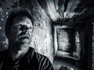 film director Greg McDonald in scary horror cave