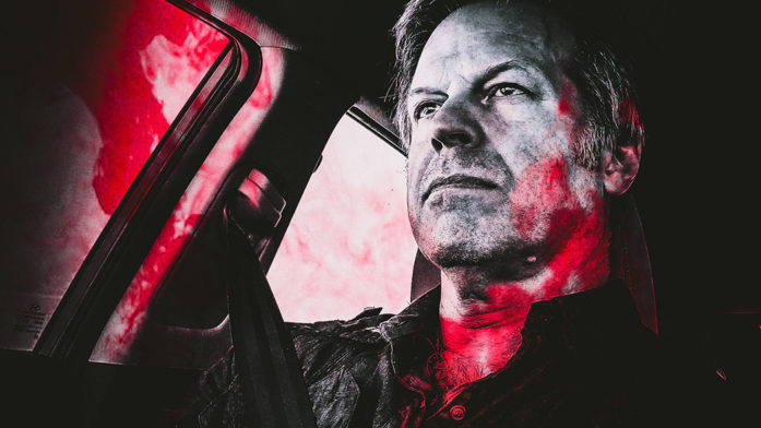 writer director Greg McDonald driving with blood on him and the car